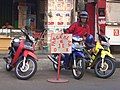 Image 35A ojek driver at the motorcycle taxi stand. (from Transport in Jakarta)