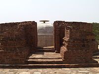 The stupa inside its building