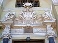 Close up of main portal with Pac's coat of arms in the middle