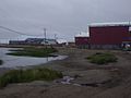 The school (blue), lake, and condemned old school (red)