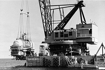 Black and white close-up of rotating crane barge