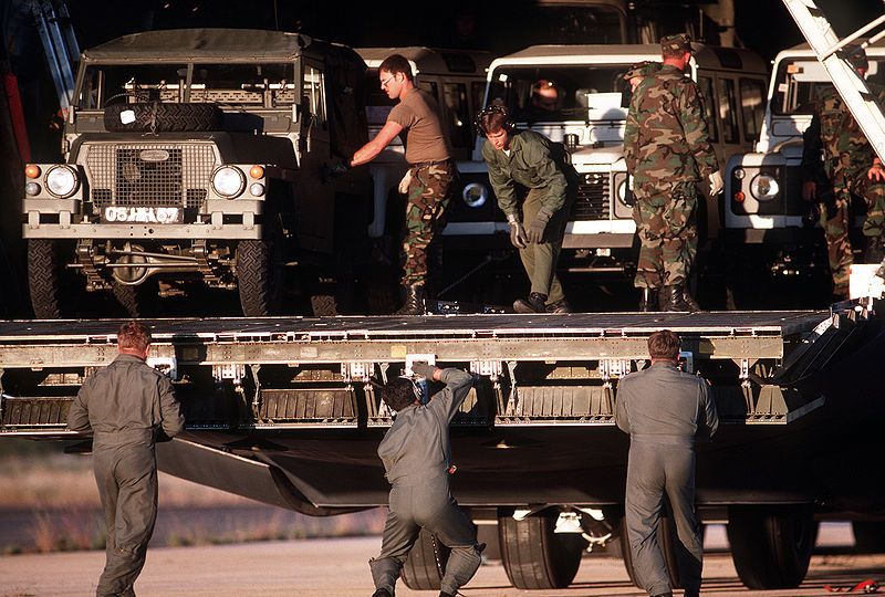 File:Land rovers offloading.jpg