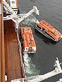 The MS Oosterdam lowering its tenders in Sitka, Alaska.