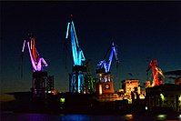 Light design by Dean Skira on cranes in Pula harbour