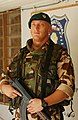 Slovak soldier stands guard in front of the Multinational Division Central-South headquarters at Camp Echo, Iraq, 2006