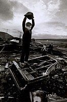 'Boy Destroying Piano' by Magnum Photographer Philip Jones Griffiths, c.1961