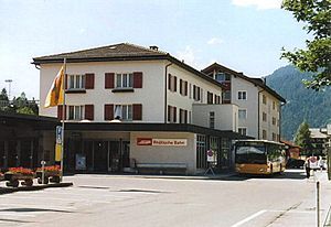 Three-story building with hip roof