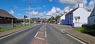 Main A487 Trunk road through the village, heading North