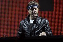 Martin Solveig in a black jacket smiling