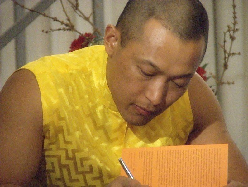 File:Sakyong, book signing.jpg