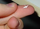 A challenging miniature version of a paper crane