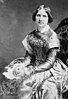 Photograph of Jenny Lind, a three-quarter length portrait of a young woman, three-quarters to the left, facing front, seated