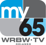 A rounded rectangle divided into blue and gray parts with the word "my" in white and a black "65" in the lower right. Underneath is the text "W R B W TV Orlando".