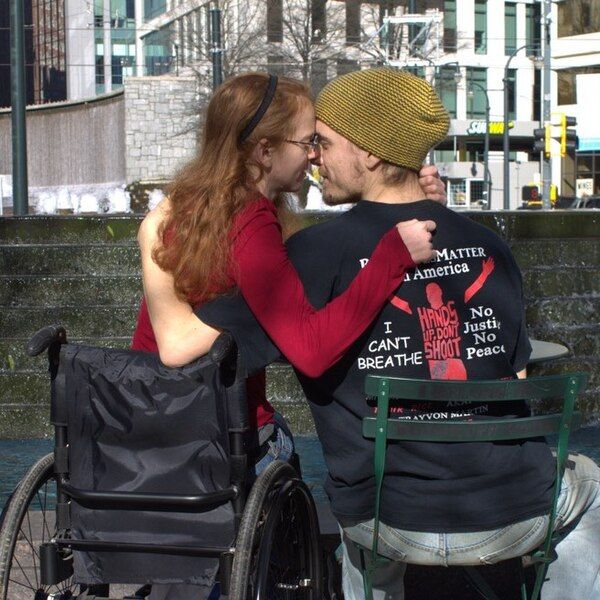 File:Affection in wheelchair.jpeg