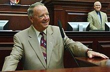 Bobby Bowden in 2007, in the Florida House of Representatives in a suit and tie.