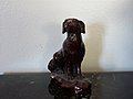 Sculpture of a chocolate Labrador Retriever.