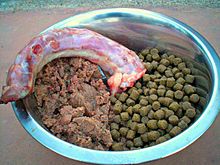 Image showing raw wet and dry pet food in the same bowl