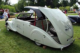 A factory Peugeot 402 Eclipse Decapotable (1938) with a retractable hardtop