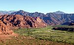 Barren mountains and plants in the valley