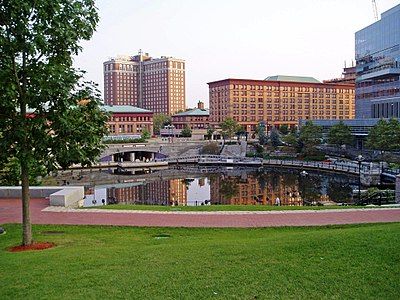 Waterplace Park is an urban park situated in downtown Providence, Rhode Island, finished in 1994. It is connected to 3/4 miles of cobblestone-paved pedestrian walkways along the waterfront known as Riverwalk.