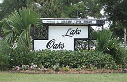 Lake Oaks sign on Elysian Fields Avenue. Note the "Developed by Orleans Levee Board" heading.