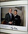 President George W. Bush congratulates Chaplain Imam Abuhena Saifulislam, the first US Navy Muslim chaplain assigned to the Marine Corps.