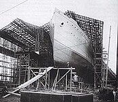 The painted hull of the Carpathia rests on the slipway, awaiting launch.