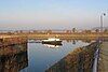 A water-filled dock with stone walls