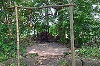 Atbaichandi idol in what remains of a temple