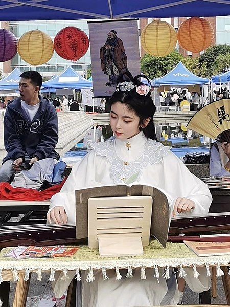 File:Girl playing Guqin.jpg