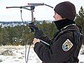 Image 18Wildlife officer tracking radio-tagged mountain lion (from Radio)