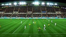 Wide-angle photo of a football match