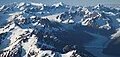 Mount Castner in lower left corner of frame. Mount Grosvenor and Meares Glacier to right.