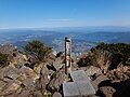 The summit of Mt. Kaimon with Lake Ikeda in the background