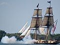 The U.S. Brig Niagara firing its cannons, off Put-in-Bay harbor