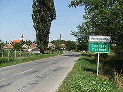 Hungarian-Croatian-Serbian city limit sign