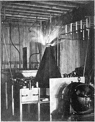 One of Tesla's early coils at his New York lab in 1892, with a conical secondary.