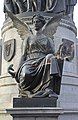 One of the four winged figures at the base of the monument