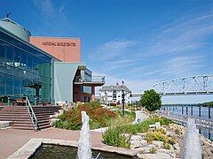 View of the riverfront plaza and walkway just outside of the National Eagle Center.