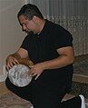 Man playing a tombak