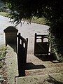 The church gates in the autumn sun