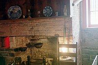 Original basement kitchen, later used as hiding place for runaway slaves on the Underground Railroad