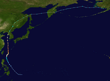 A track map showing the path of a powerful typhoon over the western Pacific Ocean. It initially moves generally northward, with small deviations to the left and right. The storm eventually reaches the Korean peninsula; at this point, it begins a very gradual turn to the east, tracking over the Russian Far East in the process. It continues eastward until dissipation off the coast of Alaska.