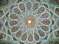 Geometric arabesque tiling on the underside of the dome of Hafiz Shirazi's tomb in Shiraz, Iran