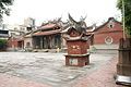 Exterior courtyard with a small tower for burning joss paper