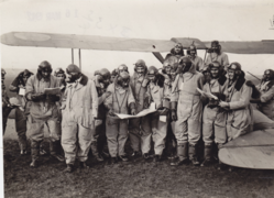 At Prestwick, Dutt second from right in front row holding a map