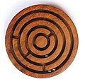 Image 6A ball-in-a-maze puzzle (from List of wooden toys)