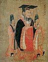 A painting of three men facing right and looking right while holding their hands in front of themselves and wearing black hats and black and pink robes