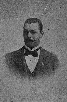 black and white headshot of Ville Heimonen age 32 wearing a tuxedo