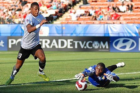 Austrian Forward Rubin Okotie tries to score on Congo Goalkeeper Destin Onka at the 2007 FIFA U-20 World Cup